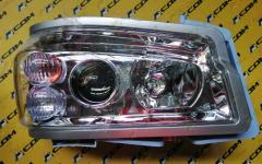 Фара передняя правая HOWO (линза) WG9719720002/3