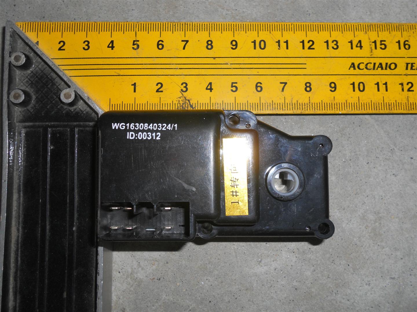 Кран отопителя HOWO WG1630840324